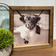 Highland Cow soaking in tub