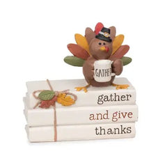 Pumpkin and Mouse on Stacked Books